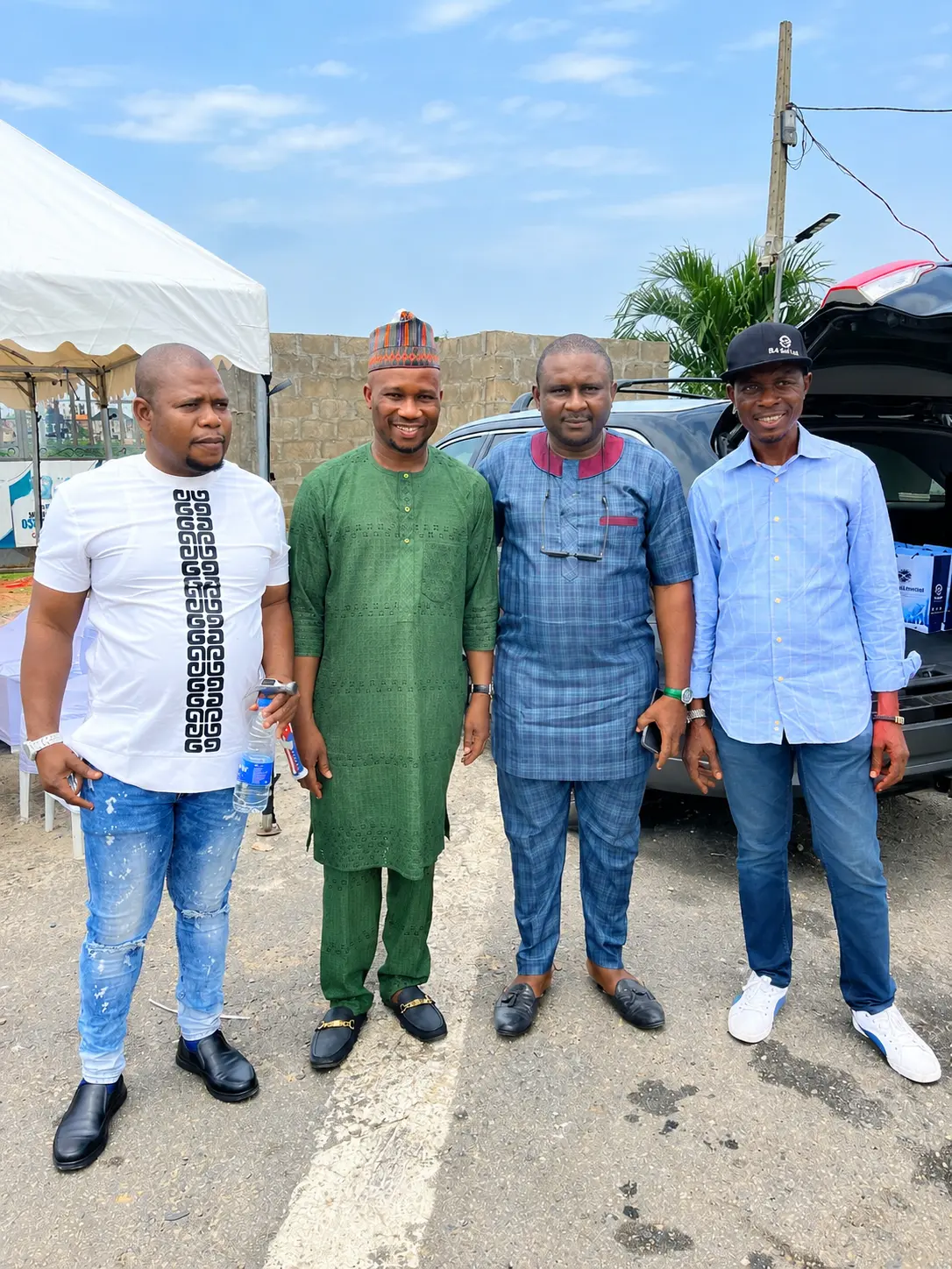 Group of attendees standing together at the event venue